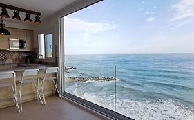 La Perla: apartamento los pies en el agua